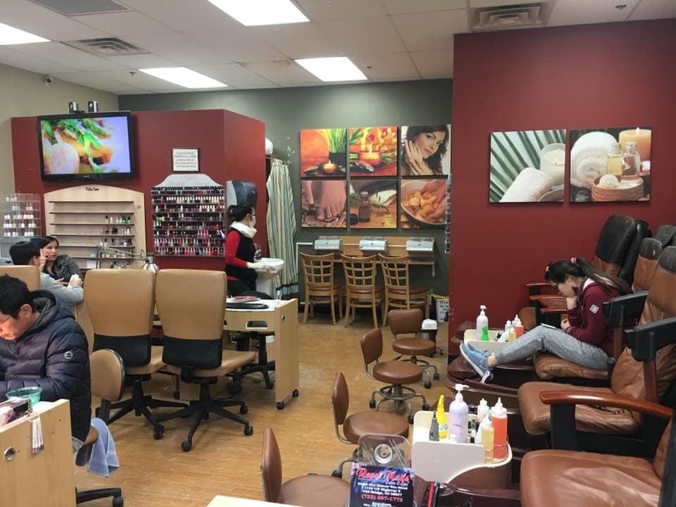 Commercial salon interior with freshly painted accent walls and finished seating area.